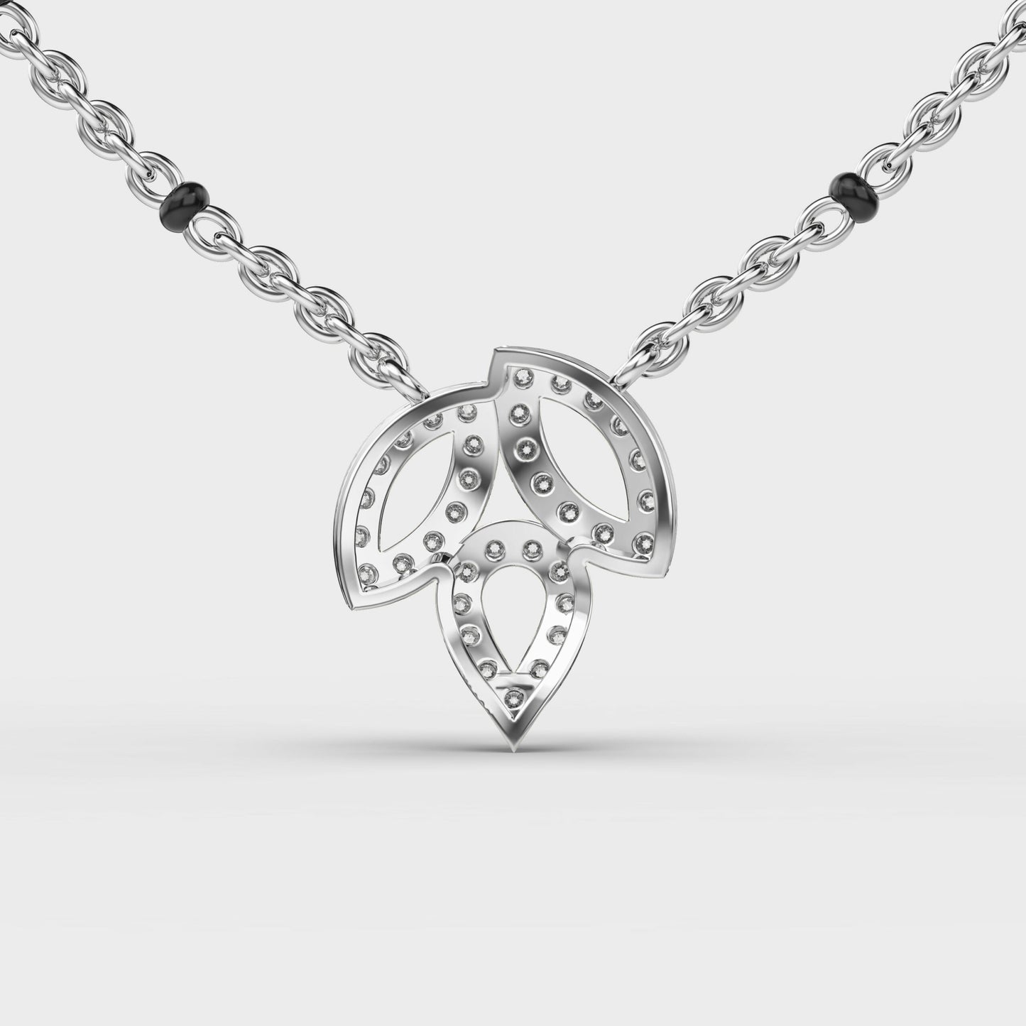trio leaf diamond encrusted pendant