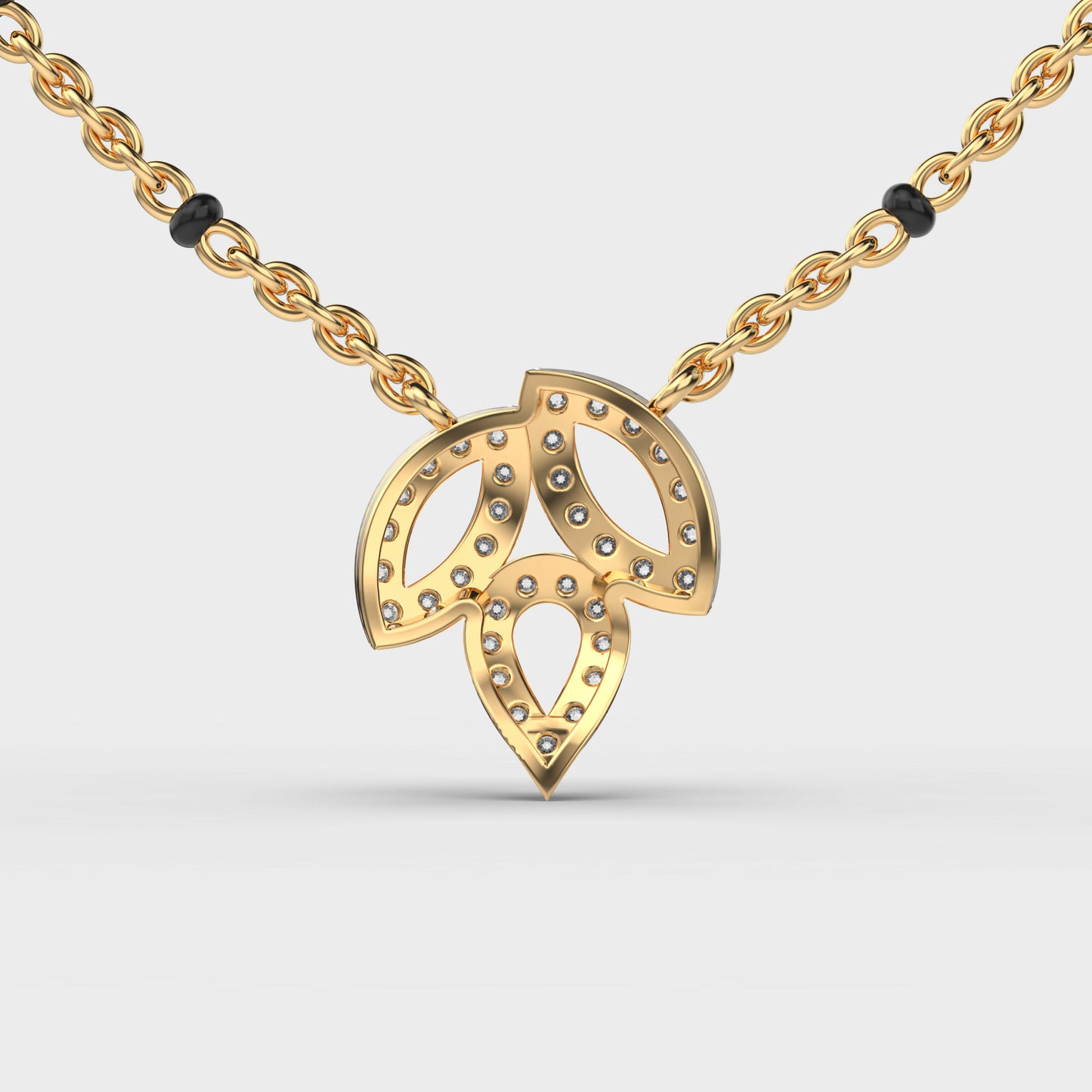 trio leaf diamond encrusted pendant