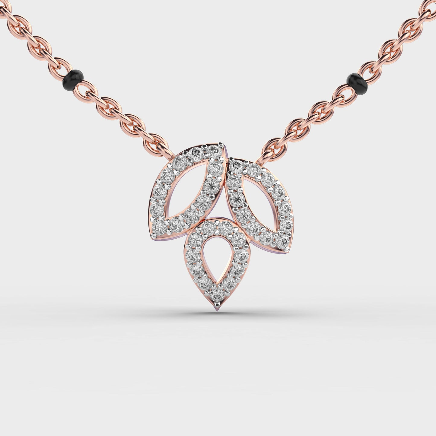 trio leaf diamond encrusted pendant