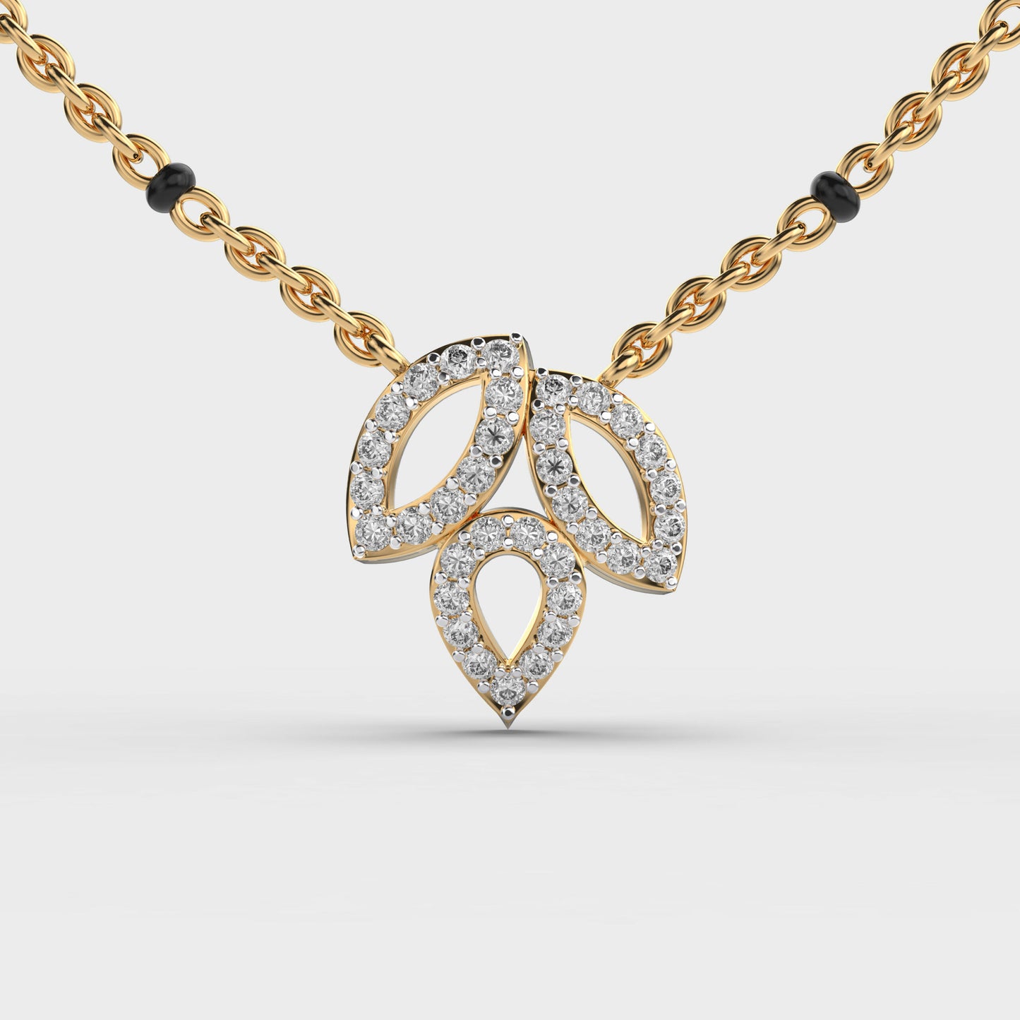 trio leaf diamond encrusted pendant
