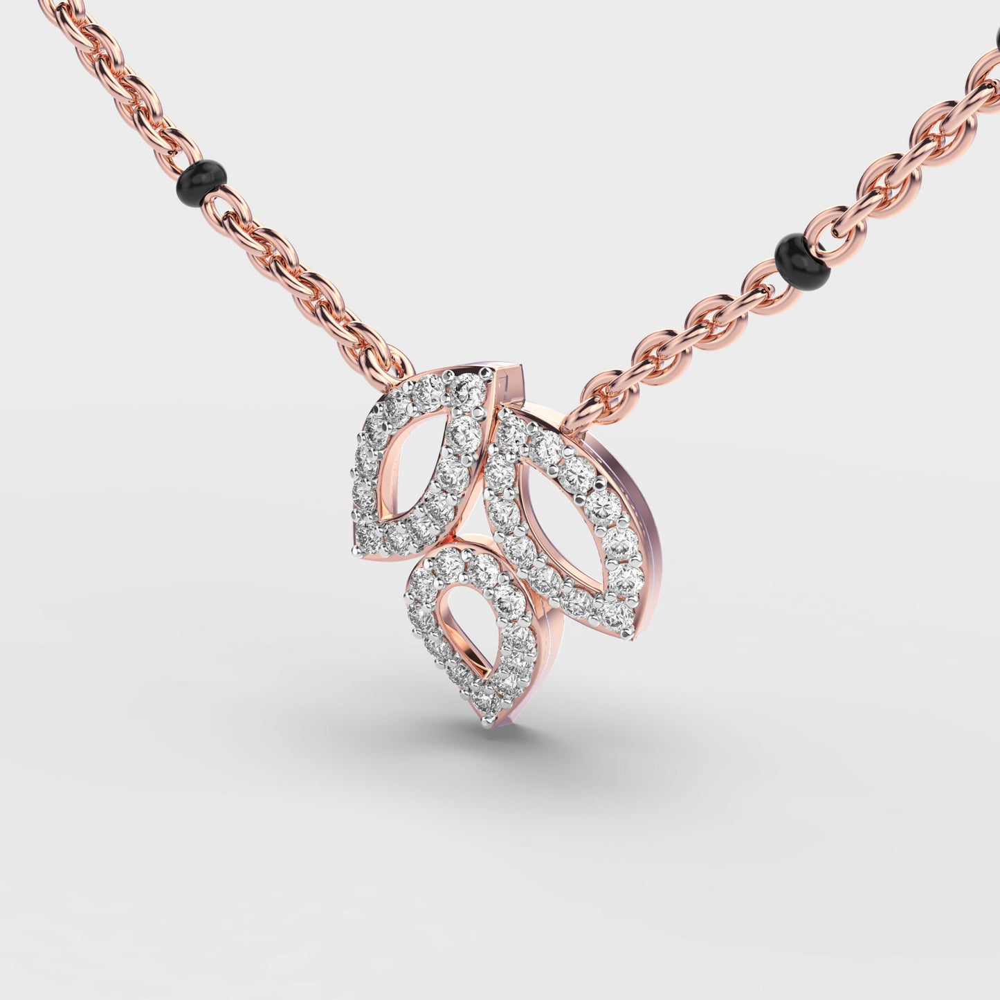 trio leaf diamond encrusted pendant