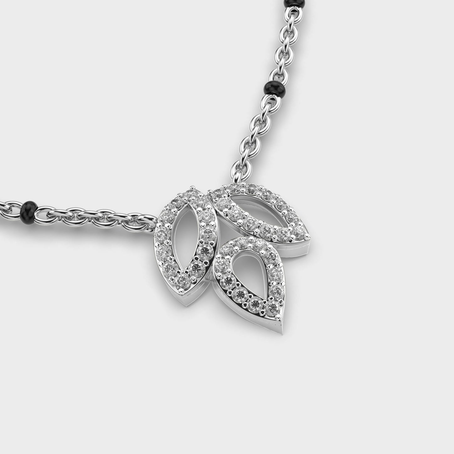 trio leaf diamond encrusted pendant