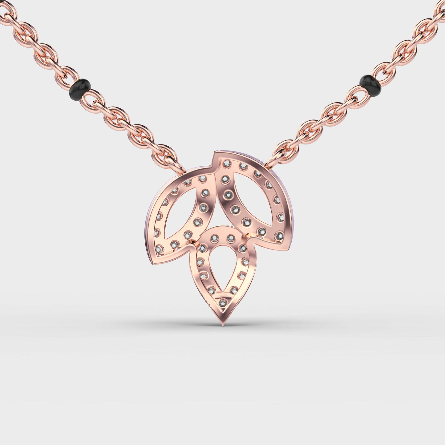trio leaf diamond encrusted pendant